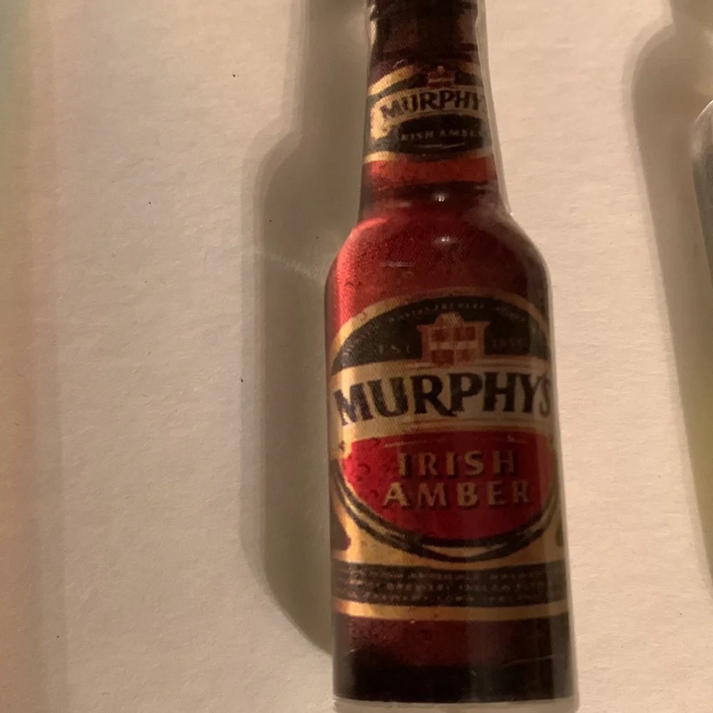 2 liquor keychains Bicardi Limon Murphys Irish amber